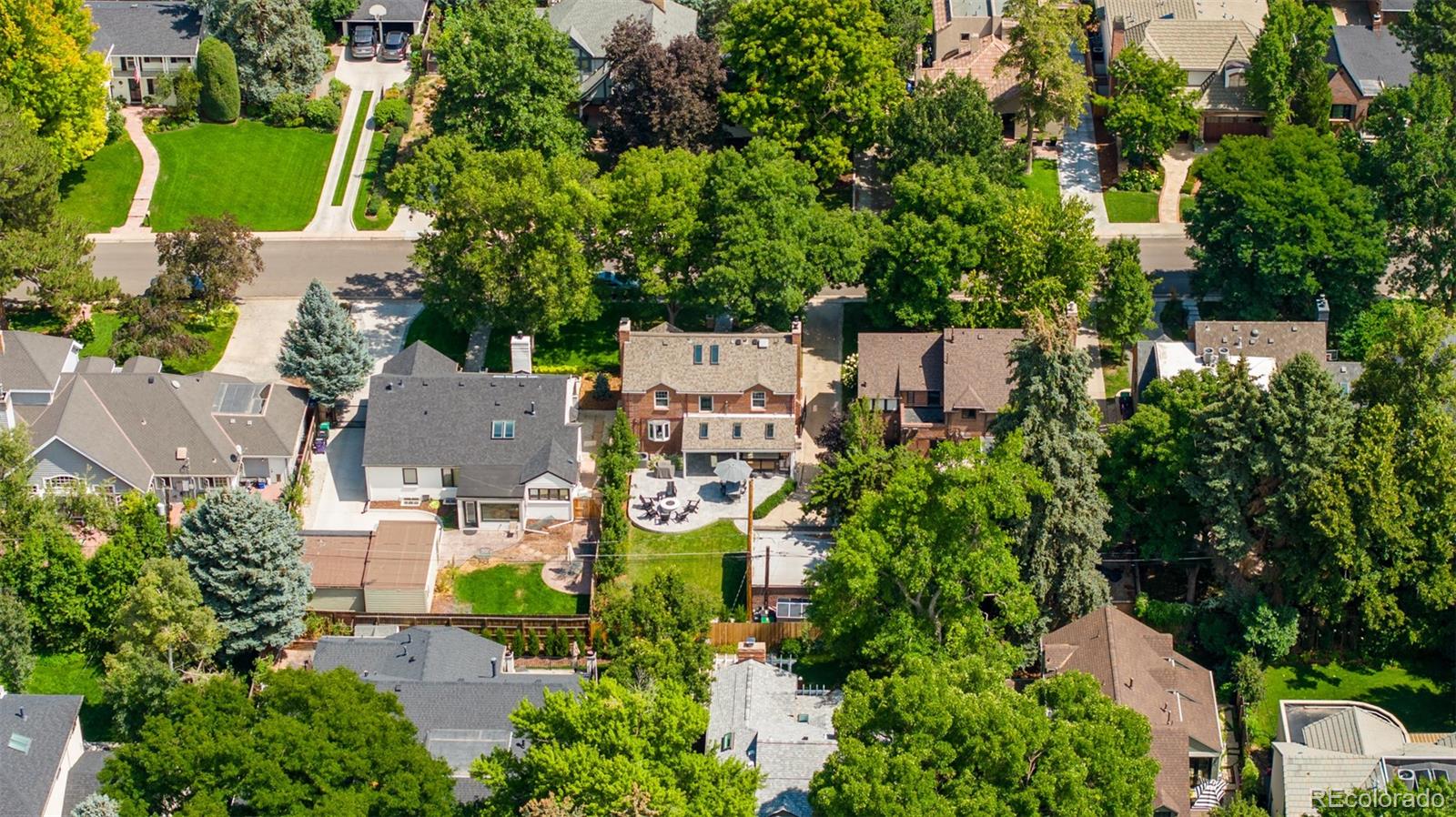 457 Elm Street Denver, CO 80220 - Photo 38 of 45 an aerial view of residential house with outdoor space and trees all around
