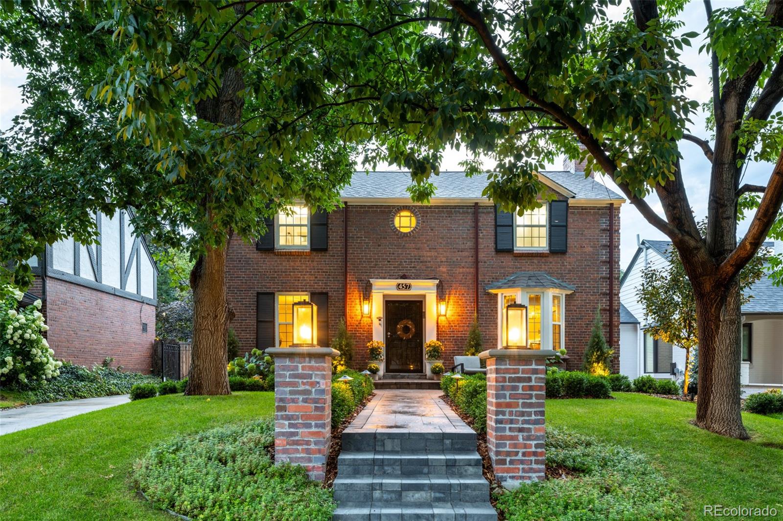 457 Elm Street Denver, CO 80220 - Photo 45 of 45 a front view of a house with garden
