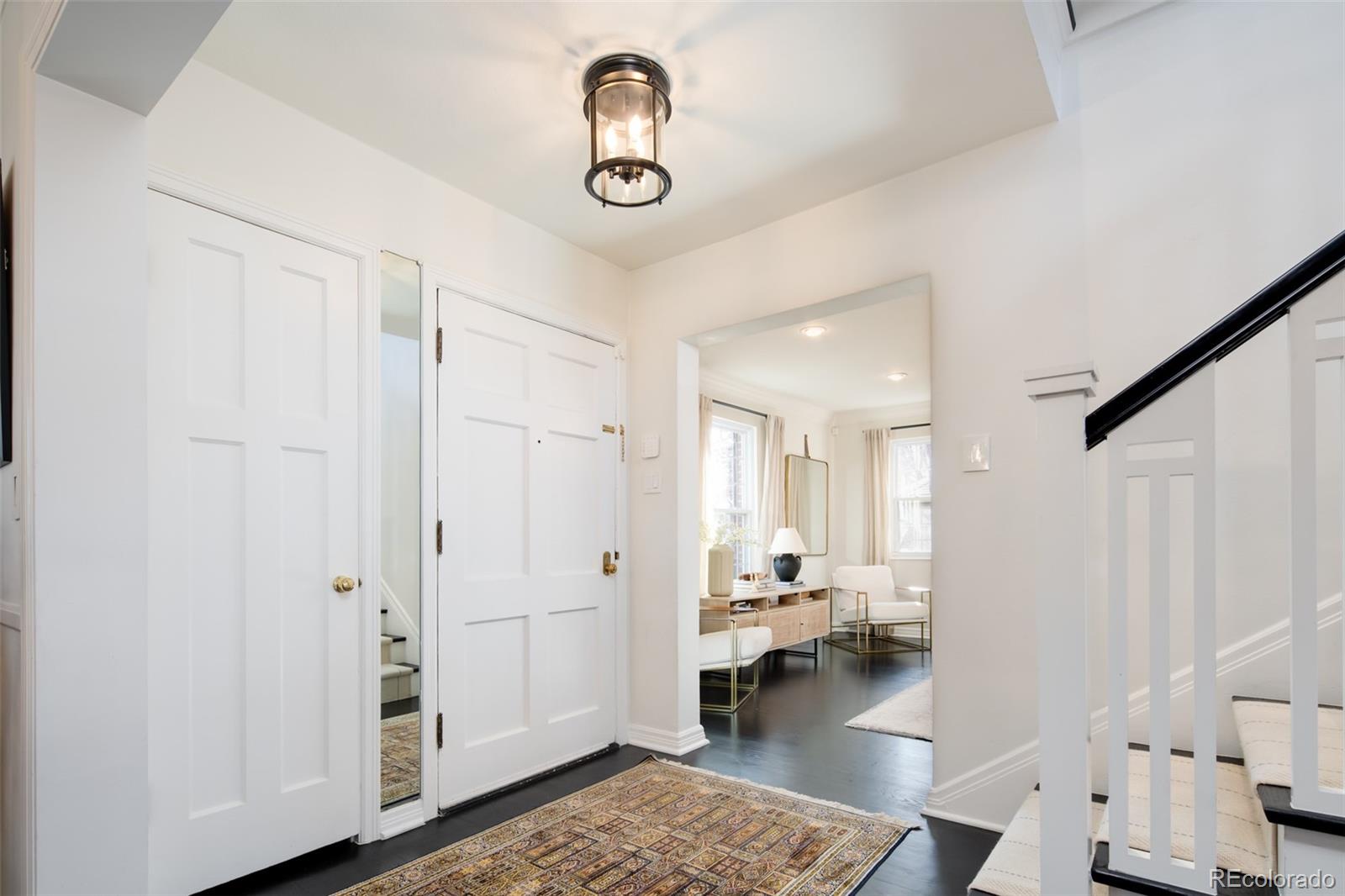 457 Elm Street Denver, CO 80220 - Photo 6 of 45 a very nice looking room with a couch