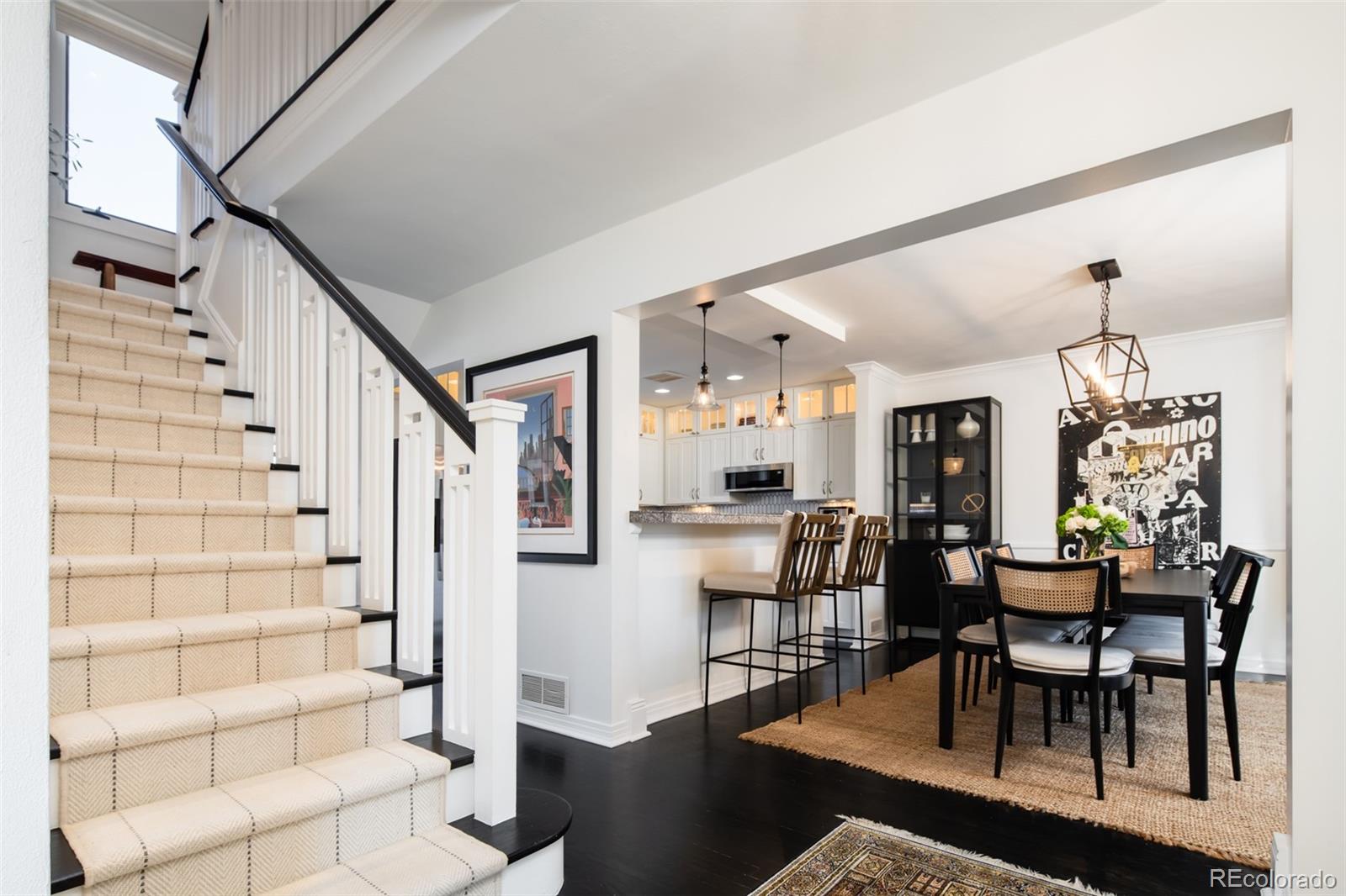 457 Elm Street Denver, CO 80220 - Photo 10 of 45 a view of a livingroom with furniture and window