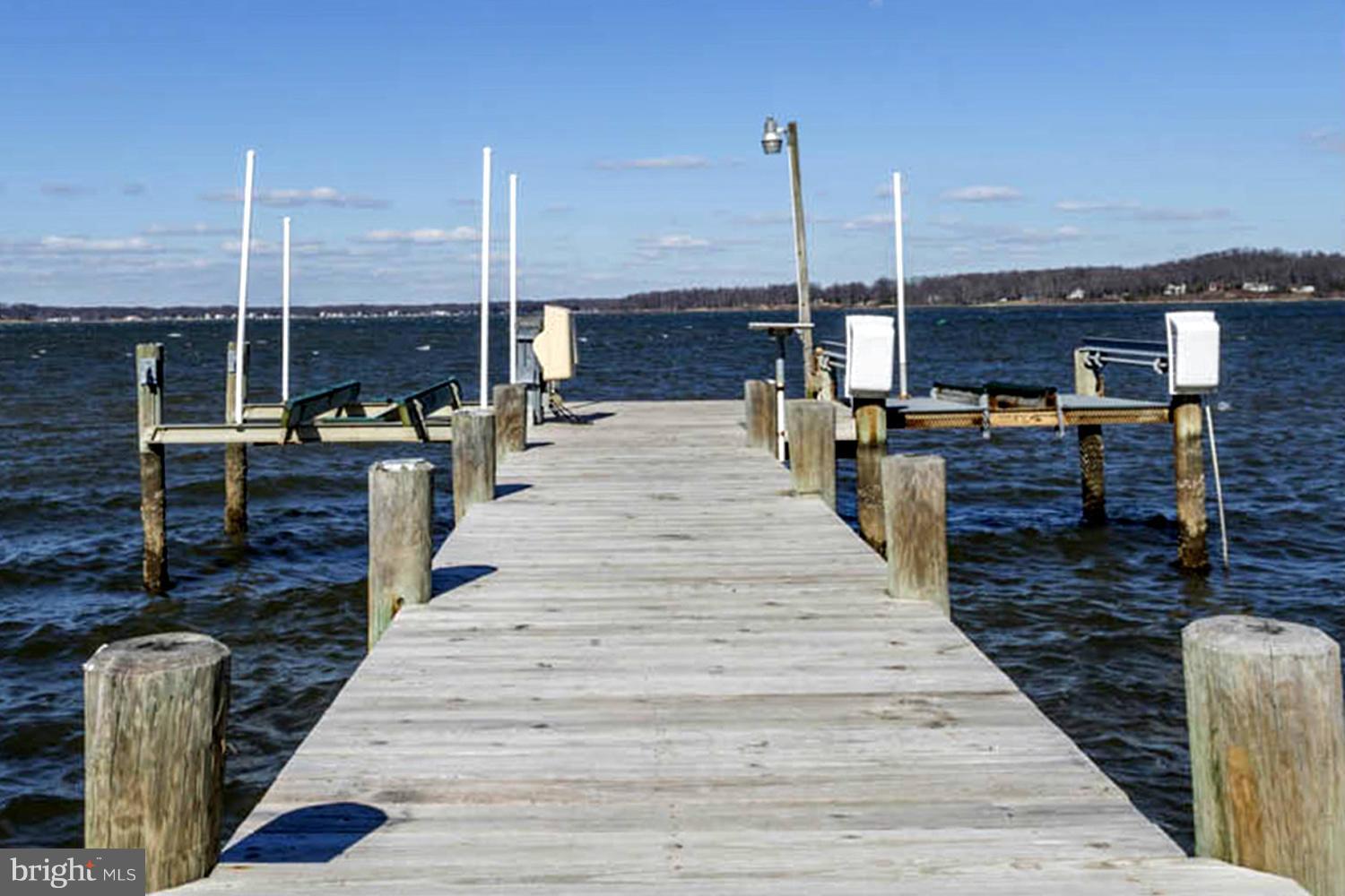 1077 Shore Acres Road Arnold, MD 21012 - Photo 6 of 30 Private Pier Boasting Boat and Jet Ski Lifts
