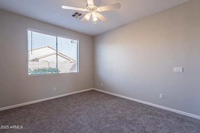 a bathroom with a sink vanity and mirror