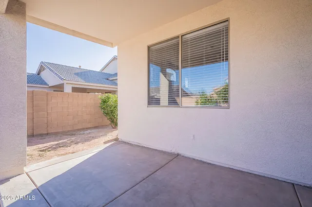 a view of a house with a patio