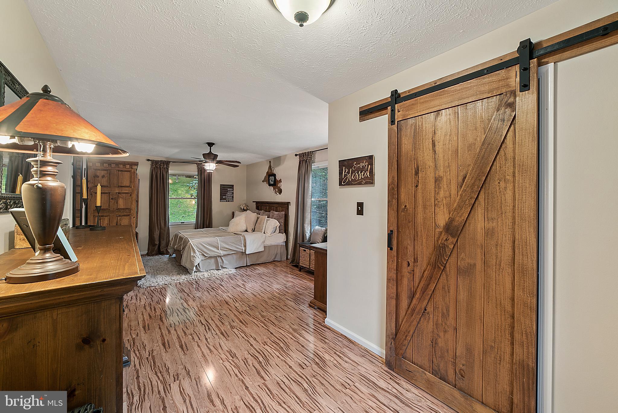 194 Hickory Nut Road Linden, VA 22642 - Photo 17 of 47 Gorgeous sliding barn door leads to walk in closet