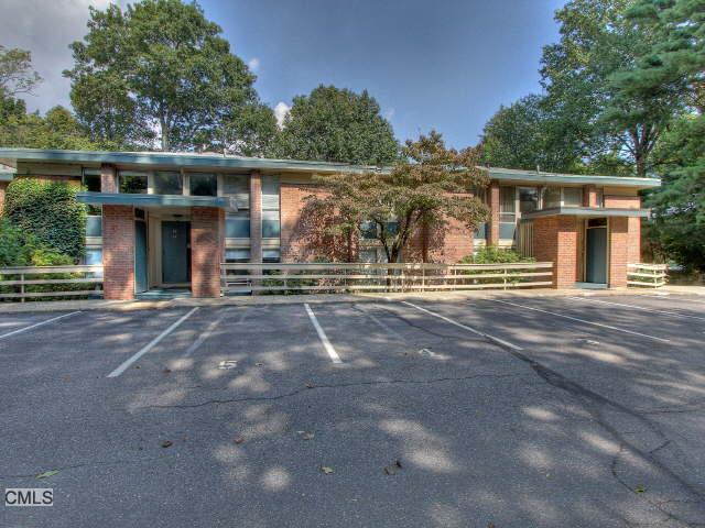 160 Fairfield Woods Road, Unit 39 Fairfield, CT 06825 - Photo 1 of 1 a view of a house with a yard