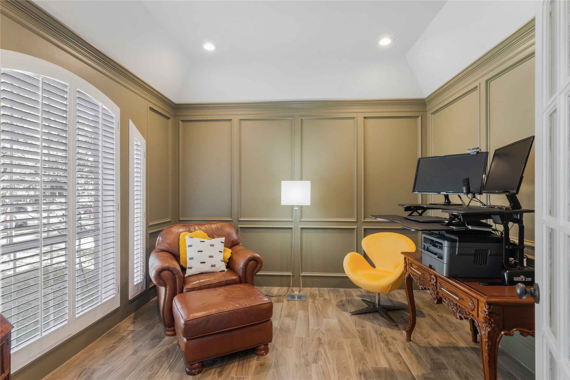 6211 Kingscrest Lane Spring, TX 77389 - Photo 8 of 39 Home office is cozy and welcoming with vaulted ceilings and a large window.