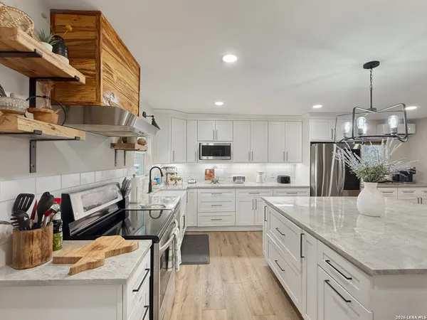 a bedroom with furniture and window
