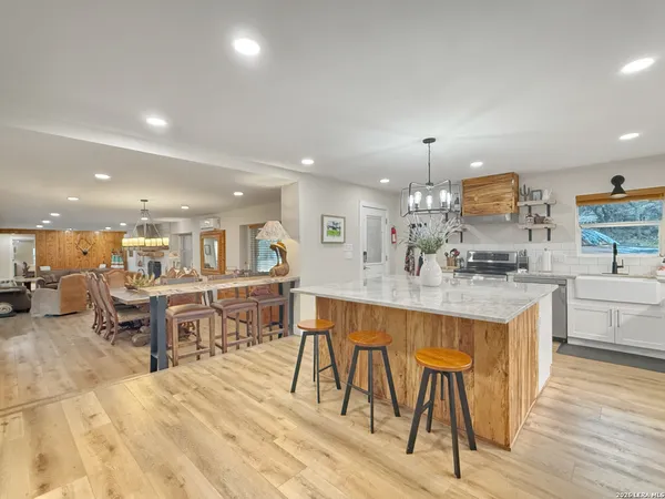 a view of a swimming pool with a lounge chair