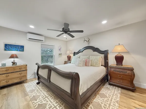 a view of a hallway with seating area