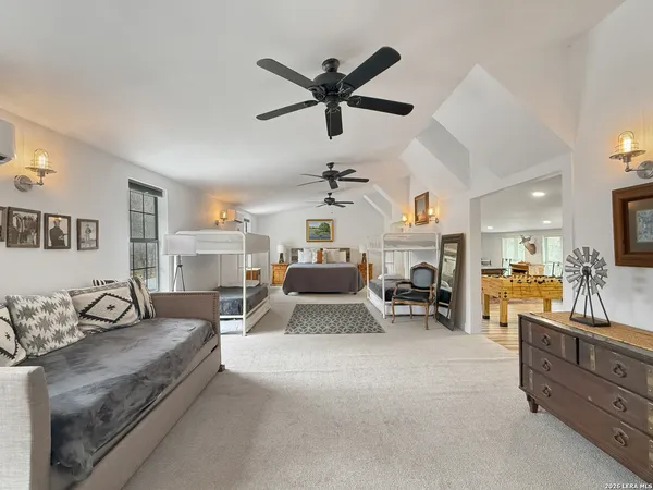 a living room with furniture and a gate