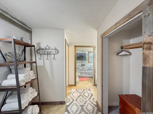 a front view of a building with small garden