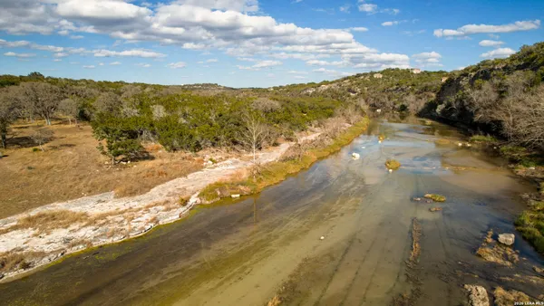 a view of outdoor space with wooden floor