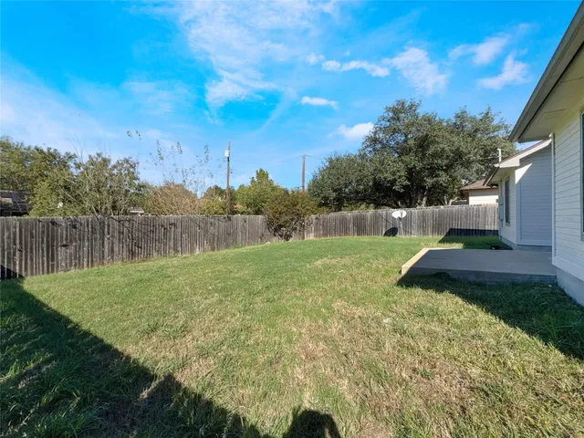 a view of a garden with a slide