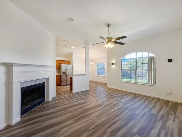 a kitchen with a refrigerator sink and stove