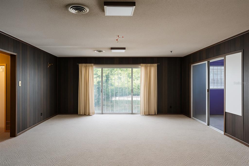 530 Southwest 23rd Avenue Ocala, FL 34471 - Photo 7 of 26 a view of an empty room with a window