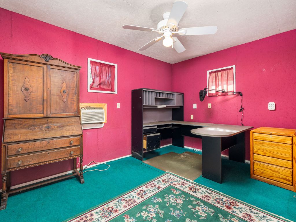 3707 Wyldwood Road Austin, TX 78739 - Photo 17 of 30 a living room with furniture and a flat screen tv