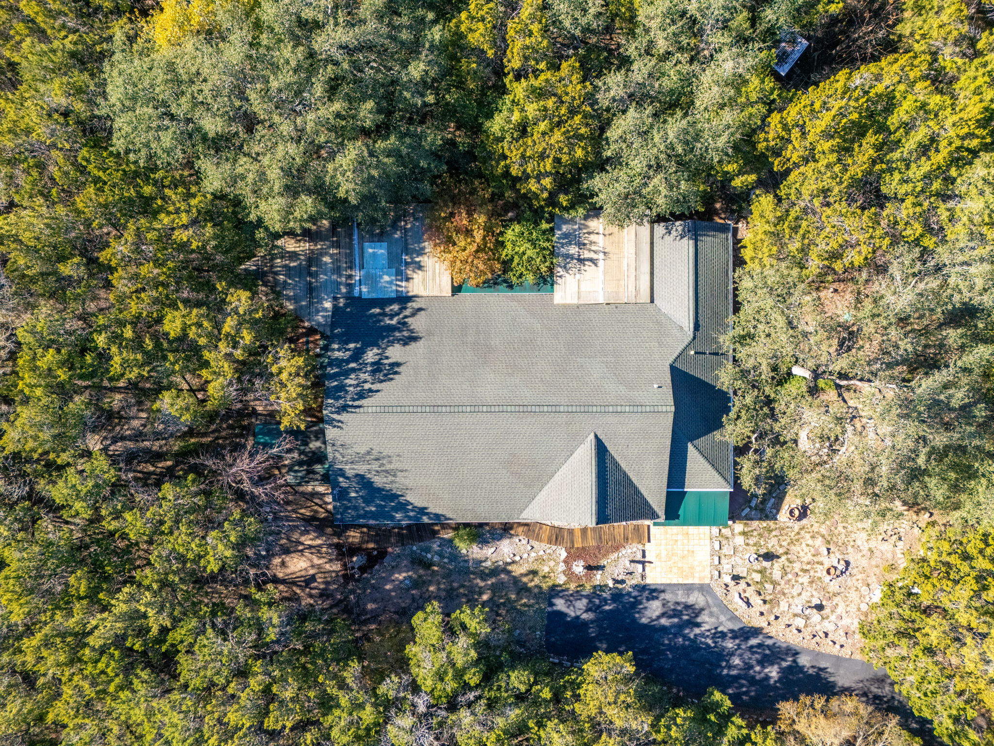 3707 Wyldwood Road Austin, TX 78739 - Photo 18 of 30 a view of a house with a yard