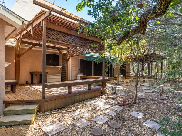 a backyard of a house with lots of green space