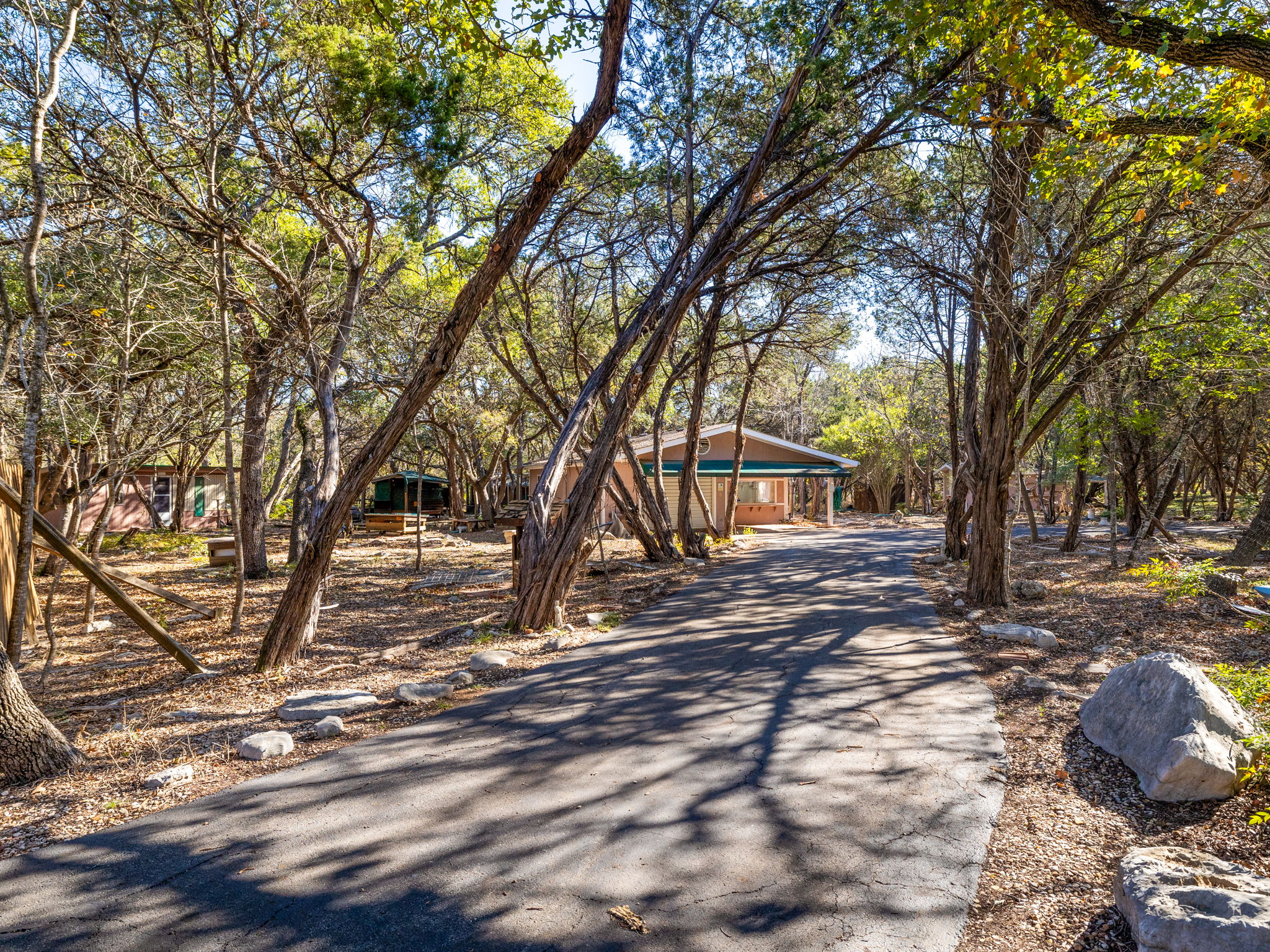 3707 Wyldwood Road Austin, TX 78739 - Photo 27 of 30 a view of a yard with plants and trees