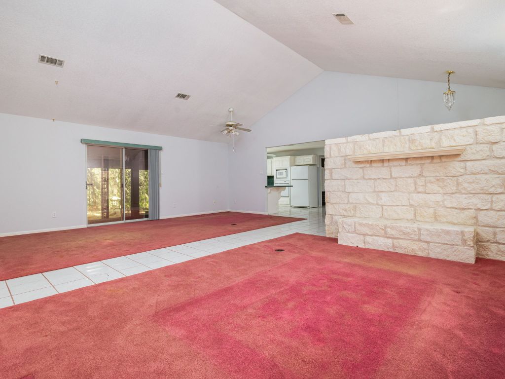 3707 Wyldwood Road Austin, TX 78739 - Photo 4 of 30 a view of empty room with a window and fireplace