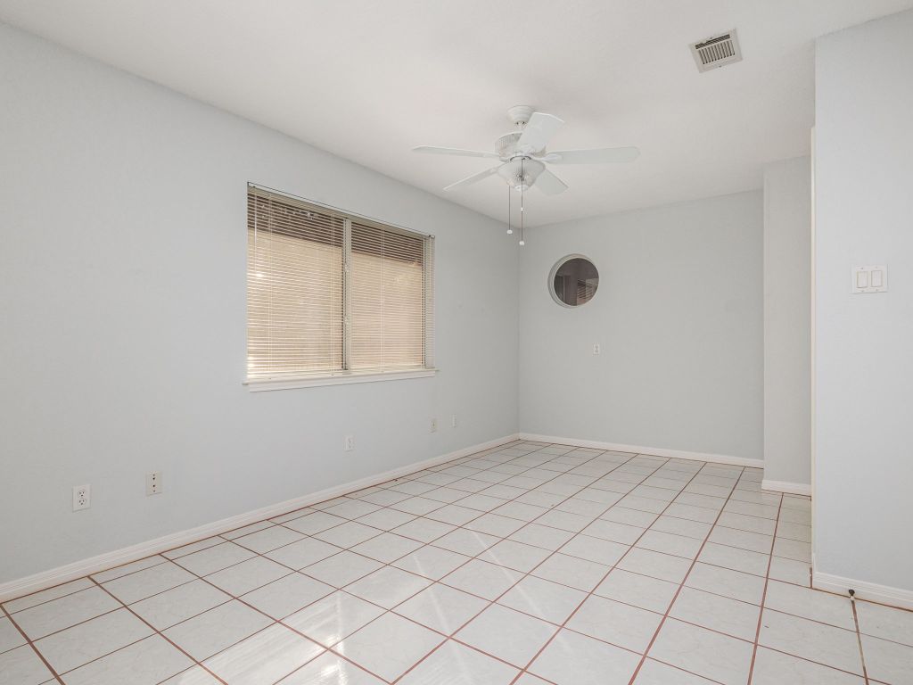 3707 Wyldwood Road Austin, TX 78739 - Photo 7 of 30 a view of an empty room with a window