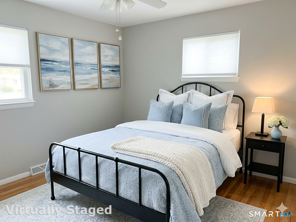 23 Ridgecrest Road Wallingford, CT 06492 - Photo 4 of 7 a bedroom with a bed and a window