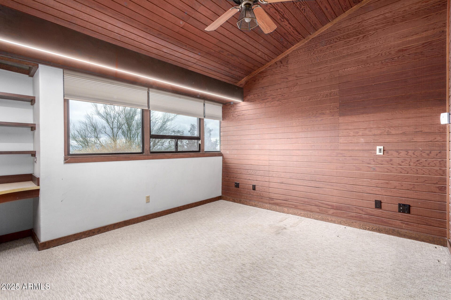 5275 North Camelhead Road Phoenix, AZ 85251 - Photo 43 of 72 a view of an empty room with a window