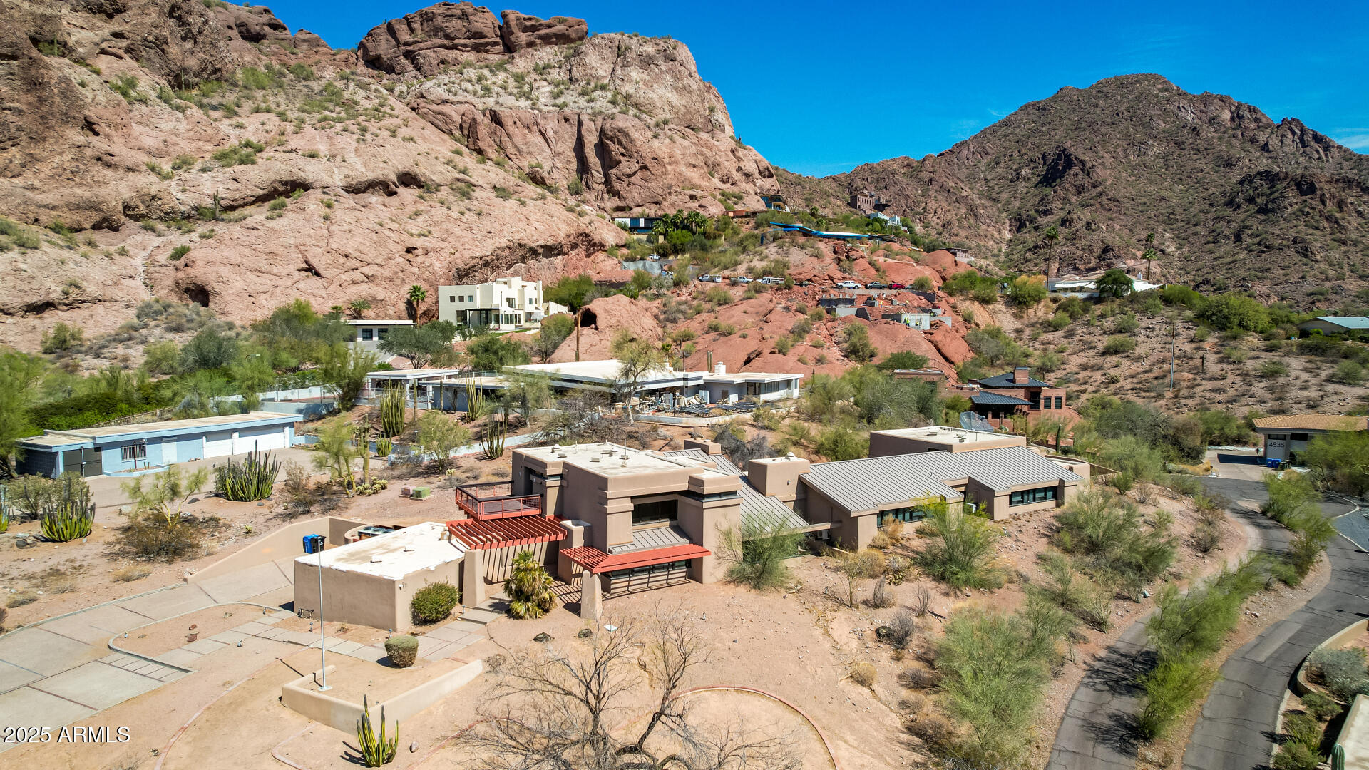 5275 North Camelhead Road Phoenix, AZ 85251 - Photo 64 of 72 an aerial view of residential houses with outdoor space