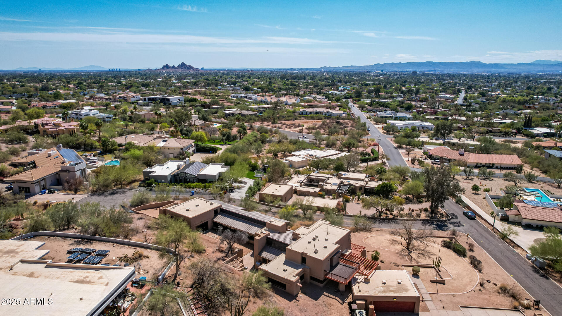 5275 North Camelhead Road Phoenix, AZ 85251 - Photo 67 of 72 an aerial view of a city