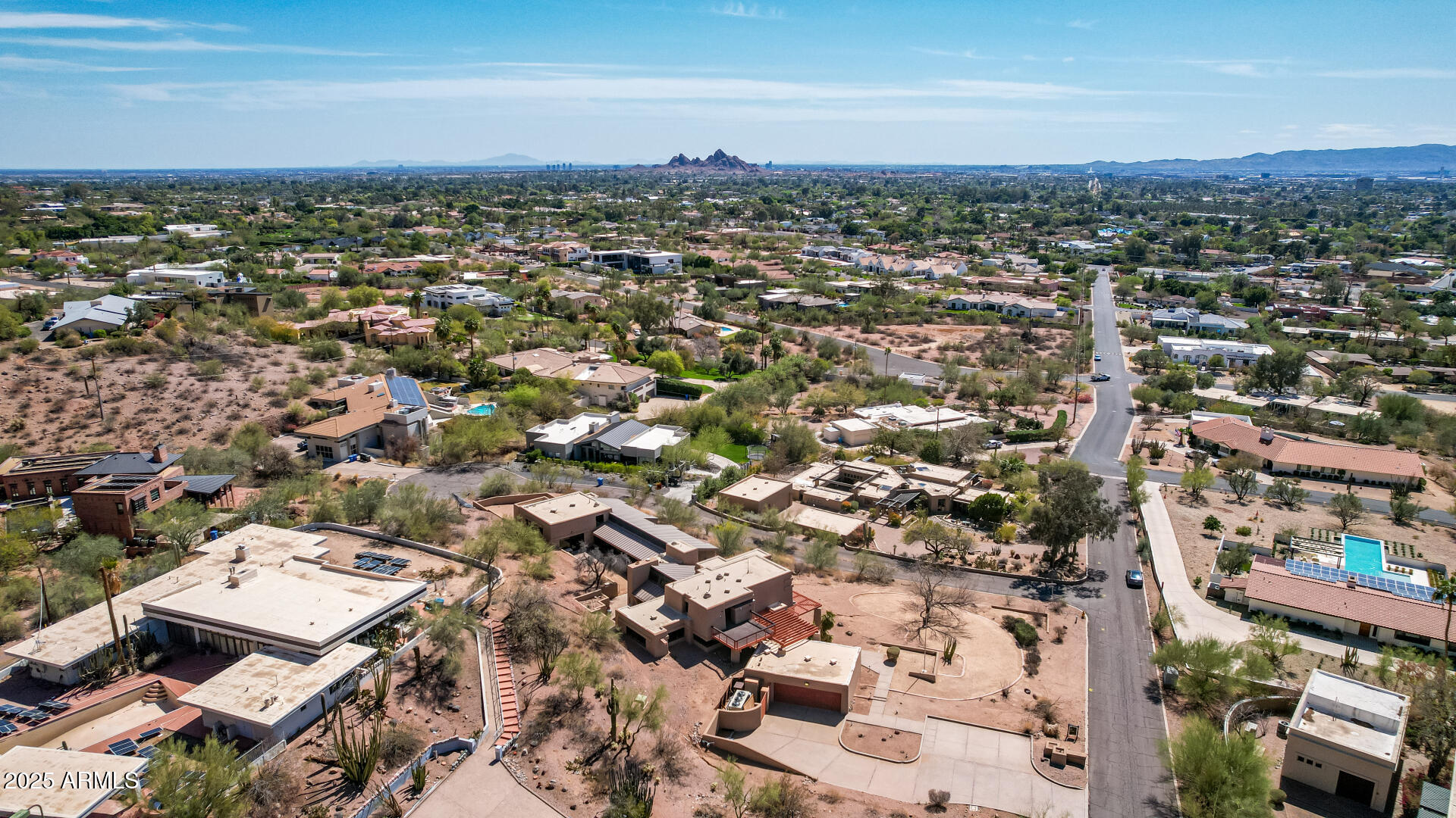 5275 North Camelhead Road Phoenix, AZ 85251 - Photo 68 of 72 an aerial view of residential building with parking space