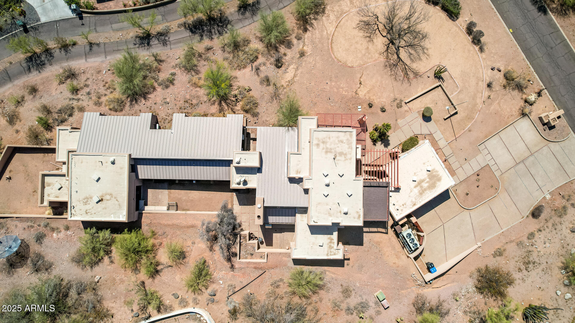 5275 North Camelhead Road Phoenix, AZ 85251 - Photo 70 of 72 an aerial view of residential houses with outdoor space