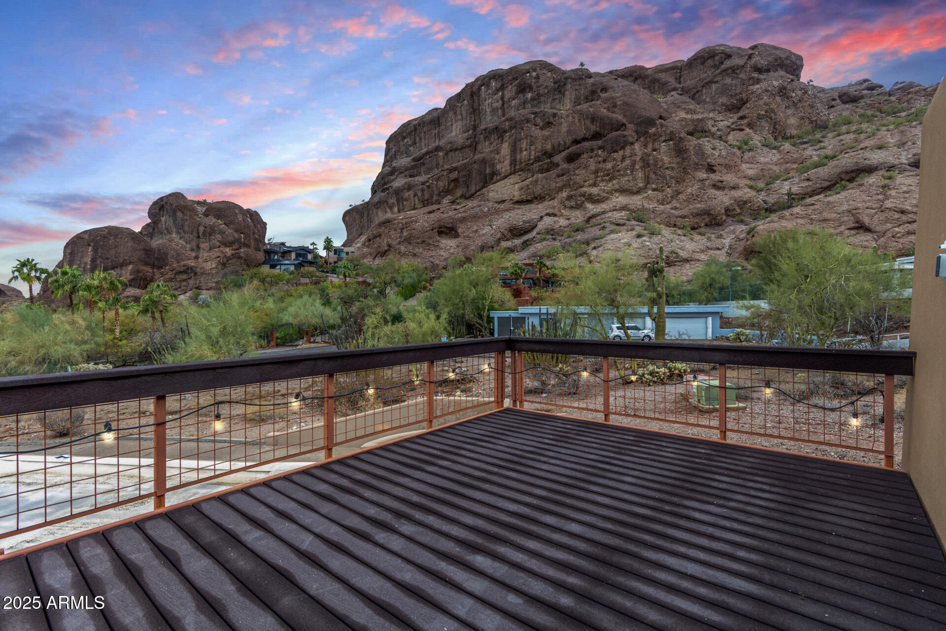 5275 North Camelhead Road Phoenix, AZ 85251 - Photo 71 of 72 a view of wooden floor with a balcony