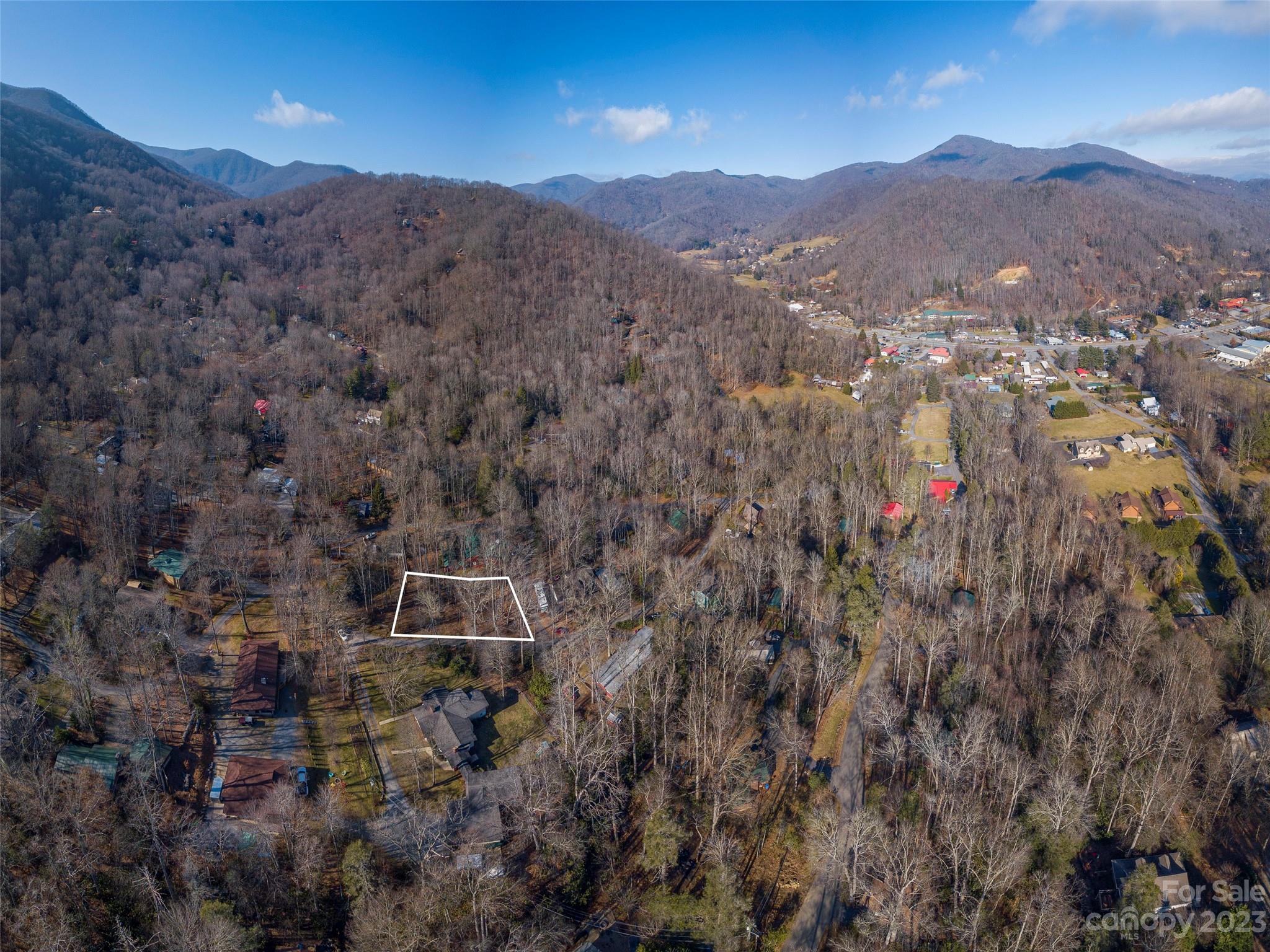 Lot 6-pt Springlake Road Maggie Valley, NC 28751 - Photo 1 of 7 a view of a lush green hillside and a mountain