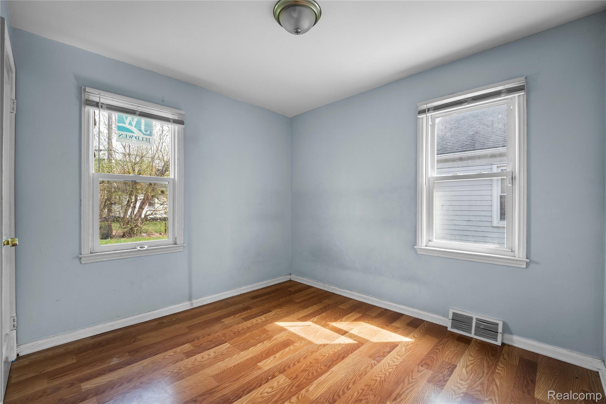 4049 Williams Street Inkster, MI 48141 - Photo 8 of 21 Unfurnished room featuring light wood-style floors and baseboards
