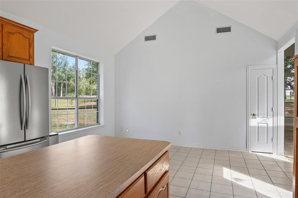 1082 Post Oak Road Copper Canyon, TX 76226 - Photo 13 of 40 an empty room with windows and closet