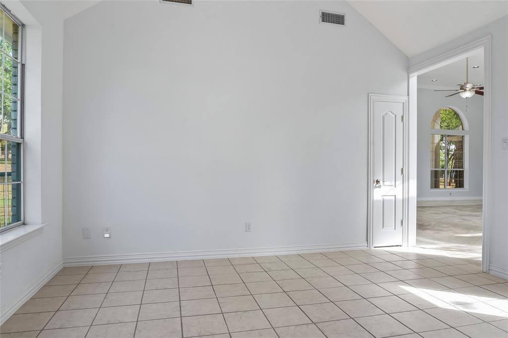 1082 Post Oak Road Copper Canyon, TX 76226 - Photo 14 of 40 a view of an entryway with window