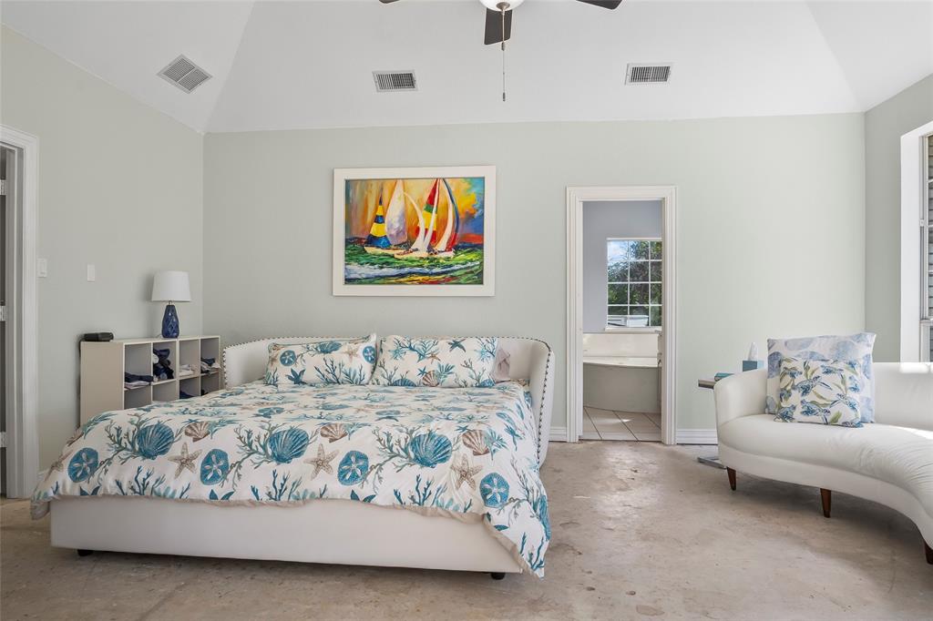 1082 Post Oak Road Copper Canyon, TX 76226 - Photo 15 of 40 a bedroom with a bed and a couch