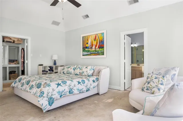 a bathroom with a tub a sink and a window