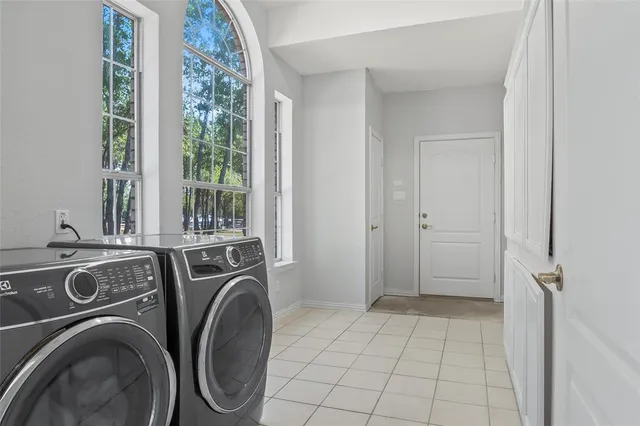 a view of a swimming pool with an outdoor space and seating area