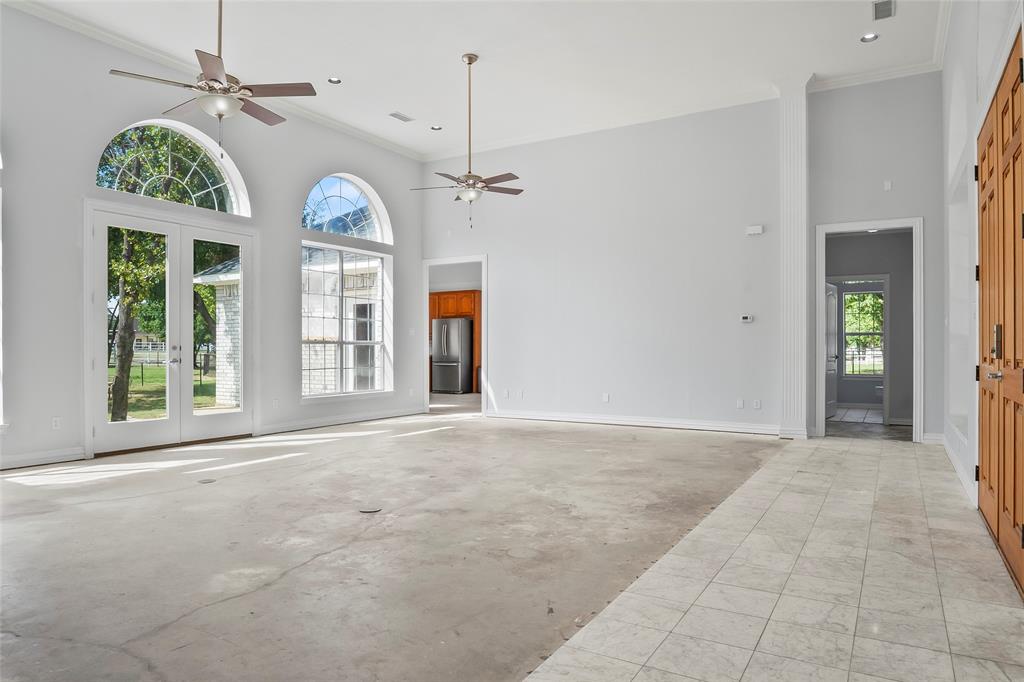 1082 Post Oak Road Copper Canyon, TX 76226 - Photo 9 of 40 a view of an empty room with a window