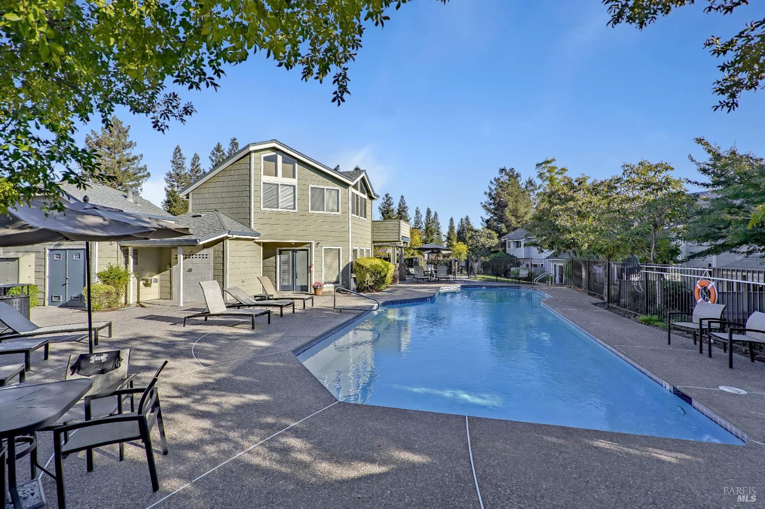 2092 Stonefield Lane Santa Rosa, CA 95403 - Photo 39 of 44 a view of a swimming pool with sitting area