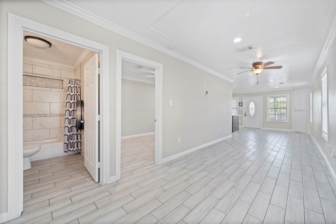 7941 Goode Street Houston, TX 77012 - Photo 15 of 26 wooden floor in an empty room with a window