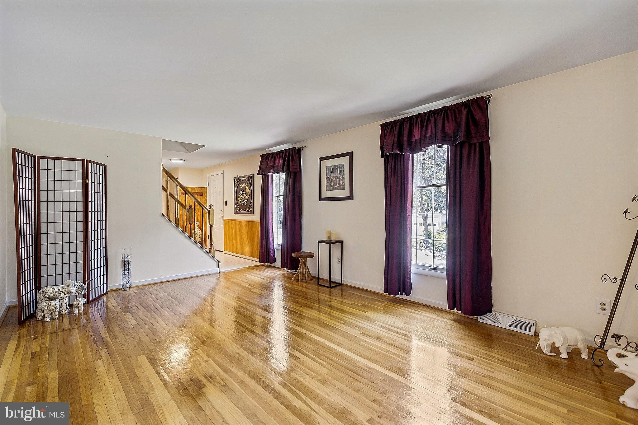5210 Windmill Lane Columbia, MD 21044 - Photo 13 of 29 a view of a room with wooden floor and window