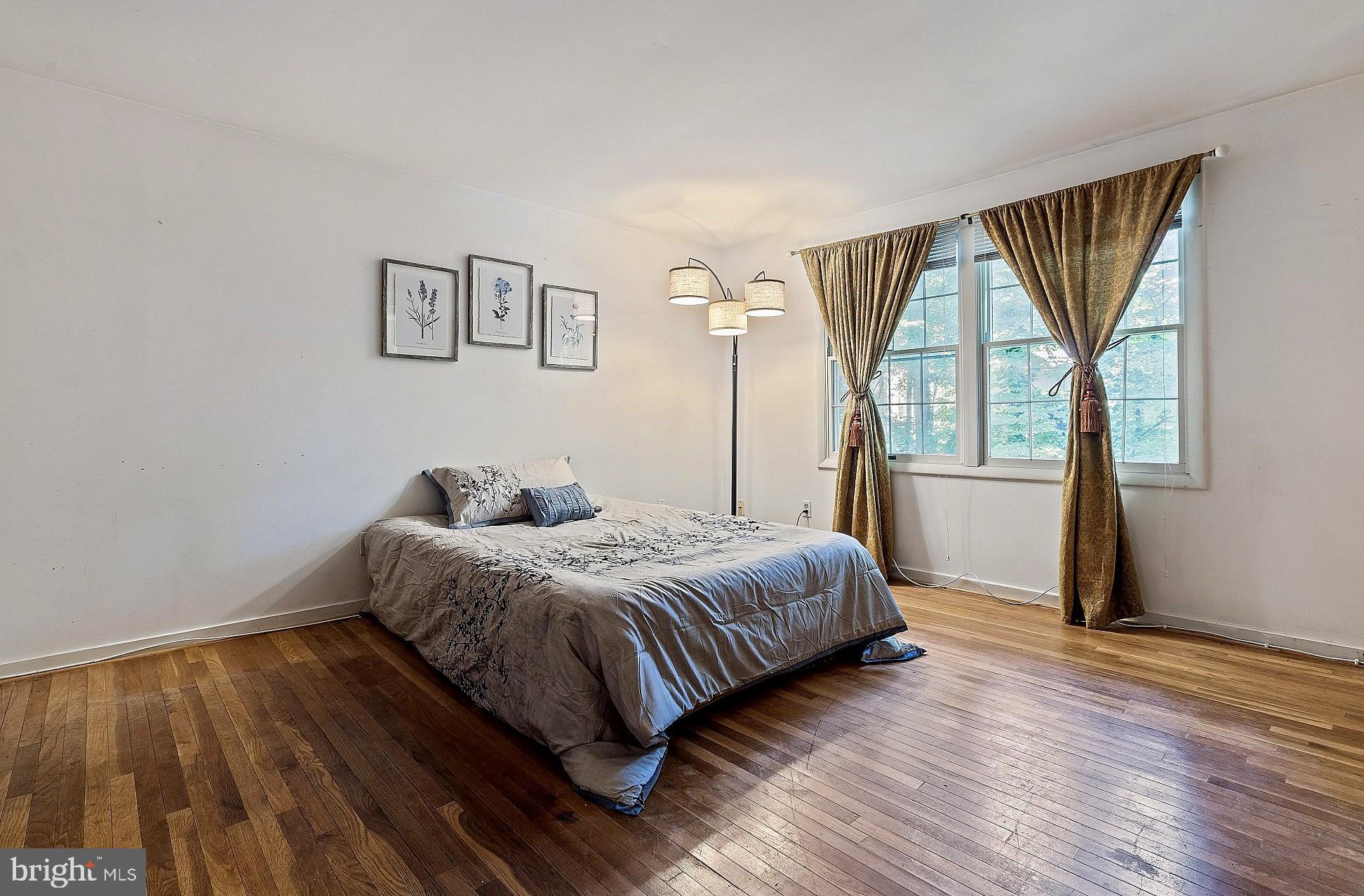 5210 Windmill Lane Columbia, MD 21044 - Photo 17 of 29 a living room with a bed furniture and a window