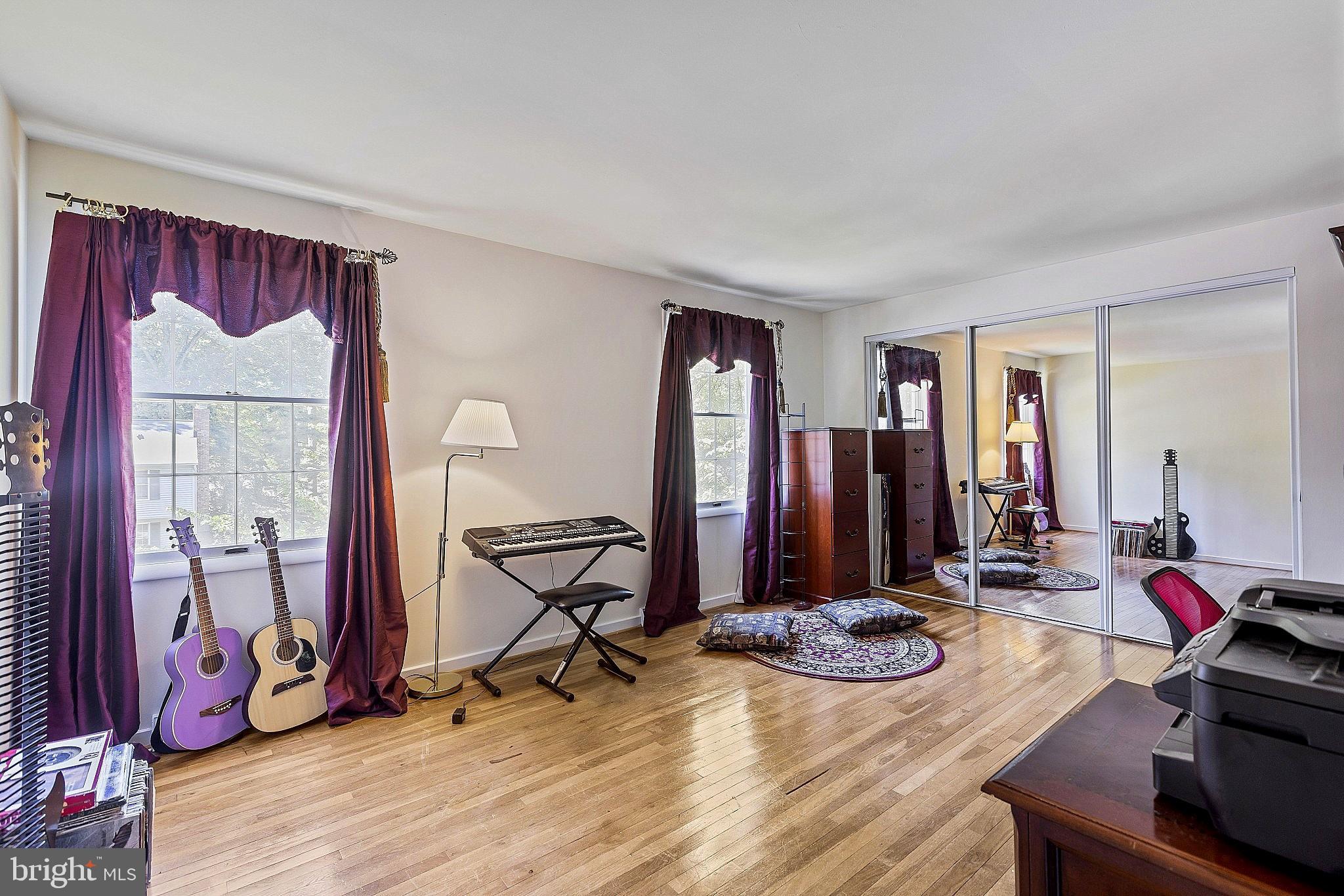 5210 Windmill Lane Columbia, MD 21044 - Photo 21 of 29 a view of a dining room with furniture and wooden floor