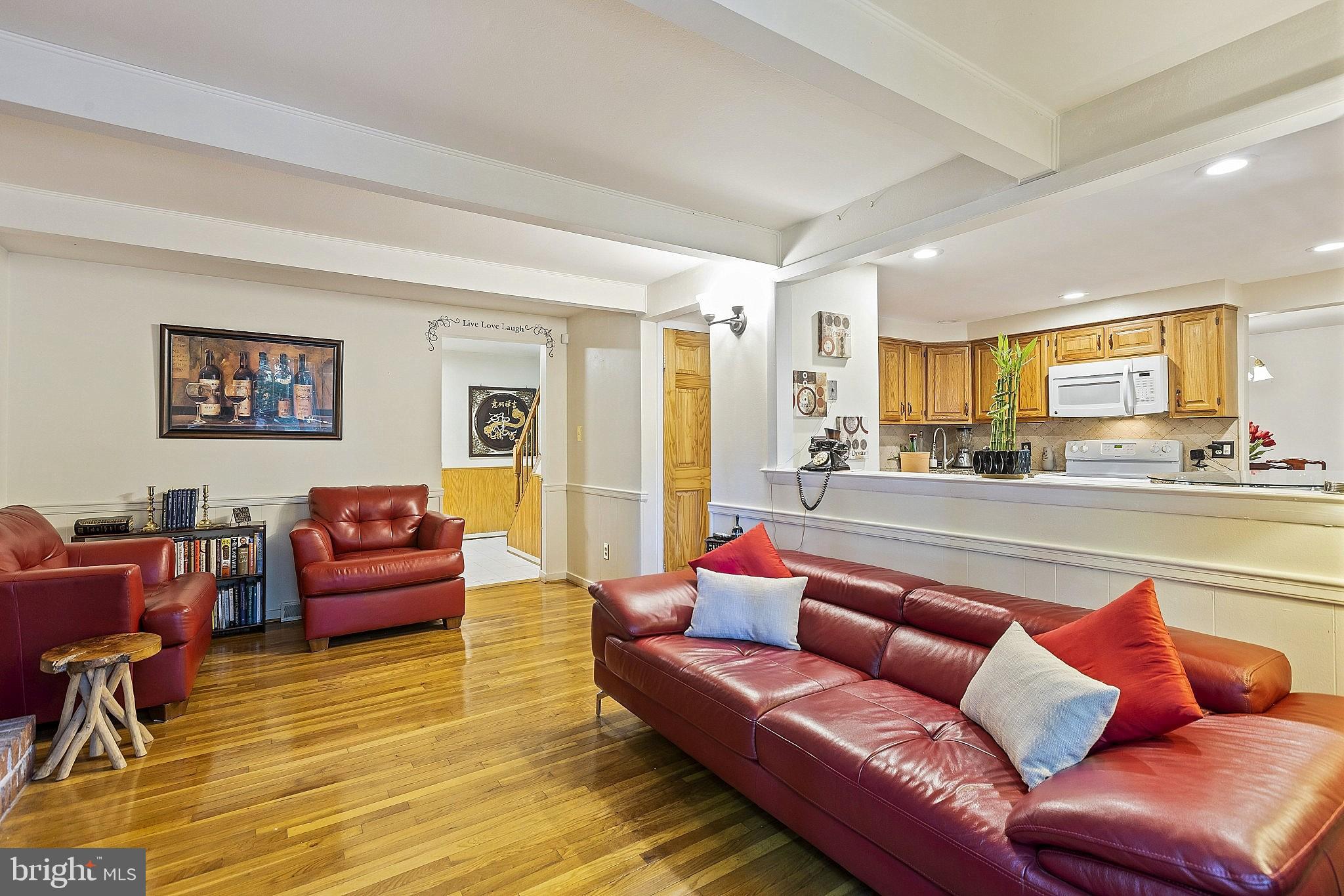 5210 Windmill Lane Columbia, MD 21044 - Photo 4 of 29 a living room with furniture and a large window