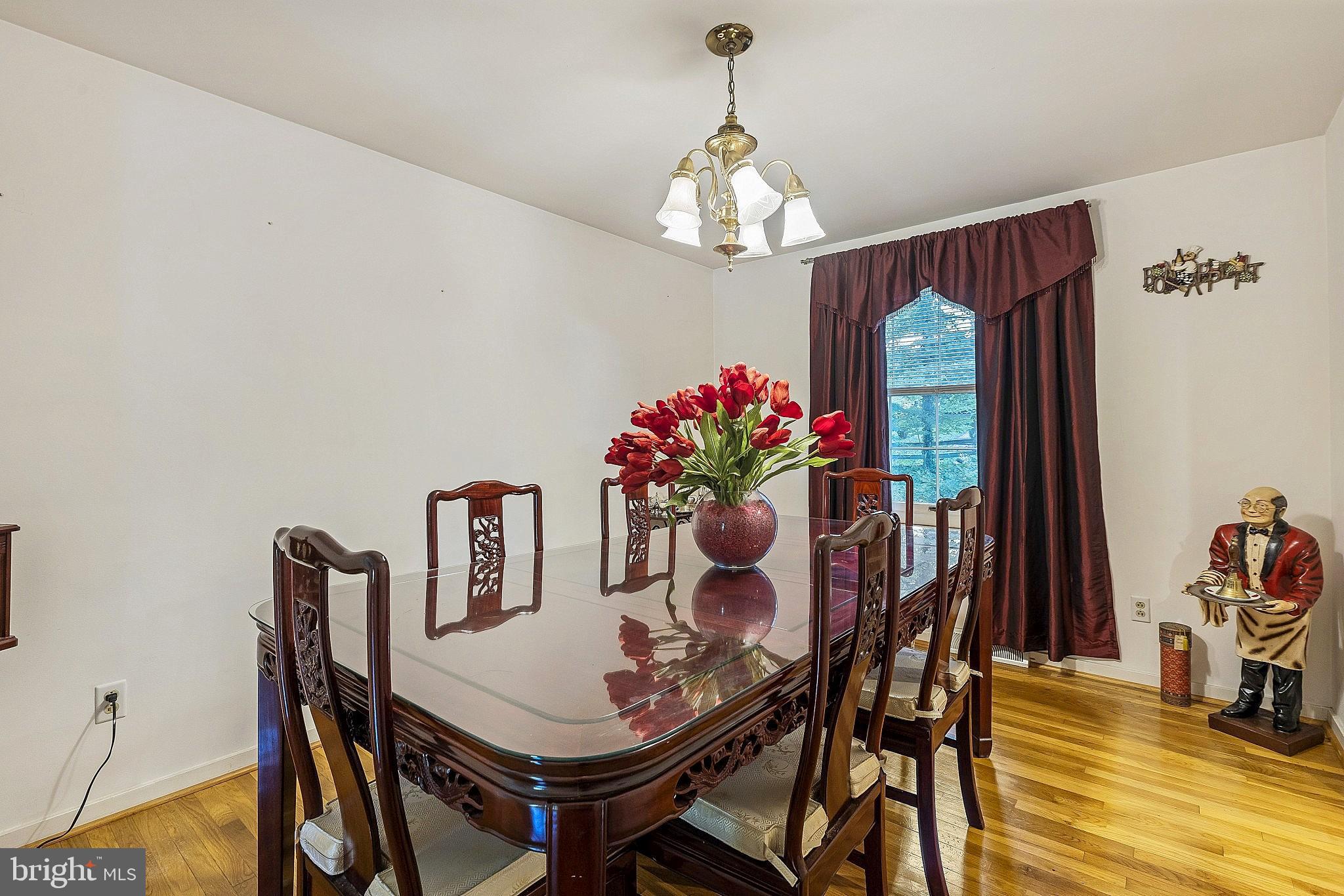 5210 Windmill Lane Columbia, MD 21044 - Photo 10 of 29 a view of a dining room with furniture and chandelier