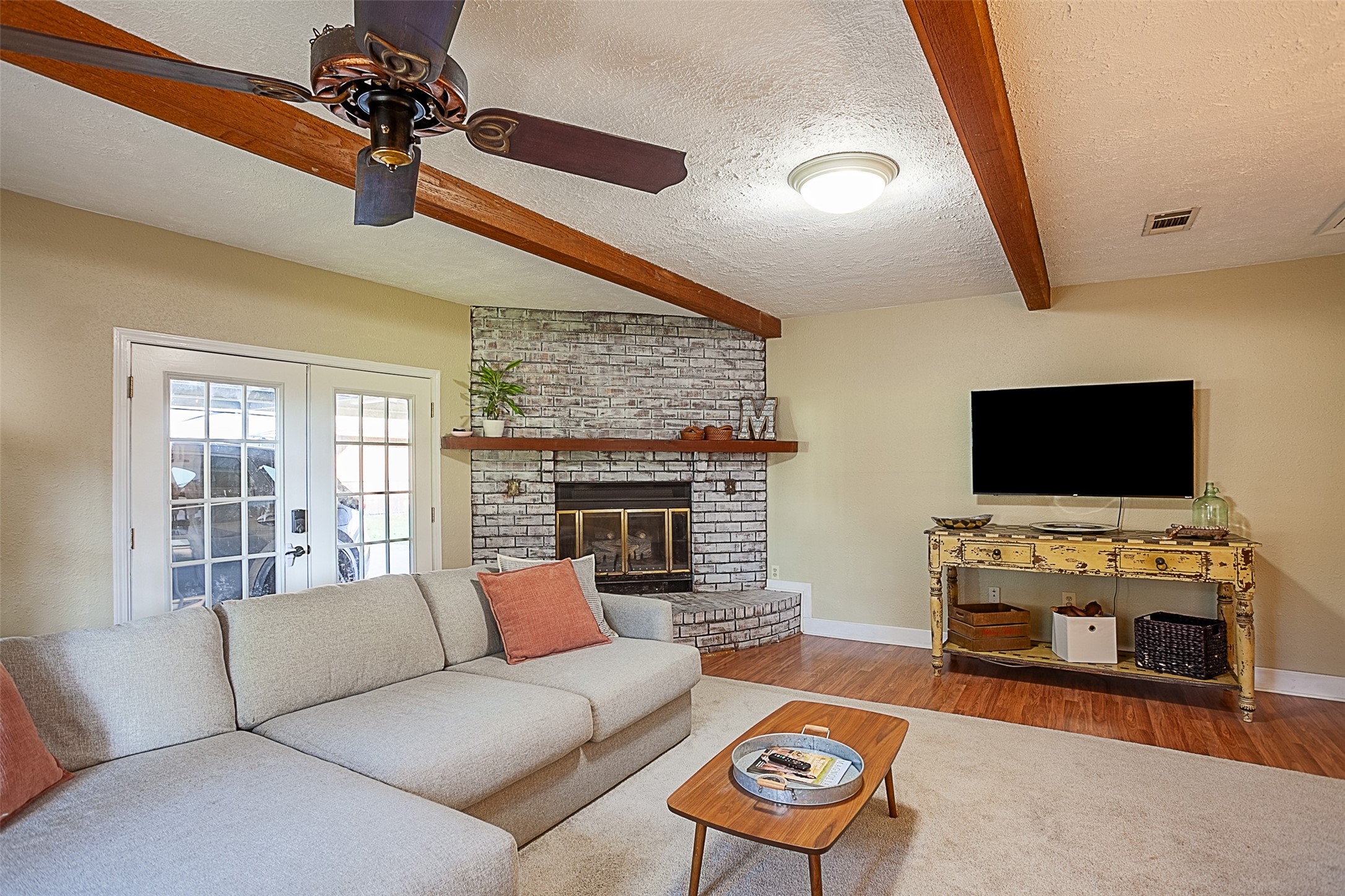 3381 Carpenter Road Orange, TX 77630 - Photo 11 of 29 a living room with furniture and a flat screen tv
