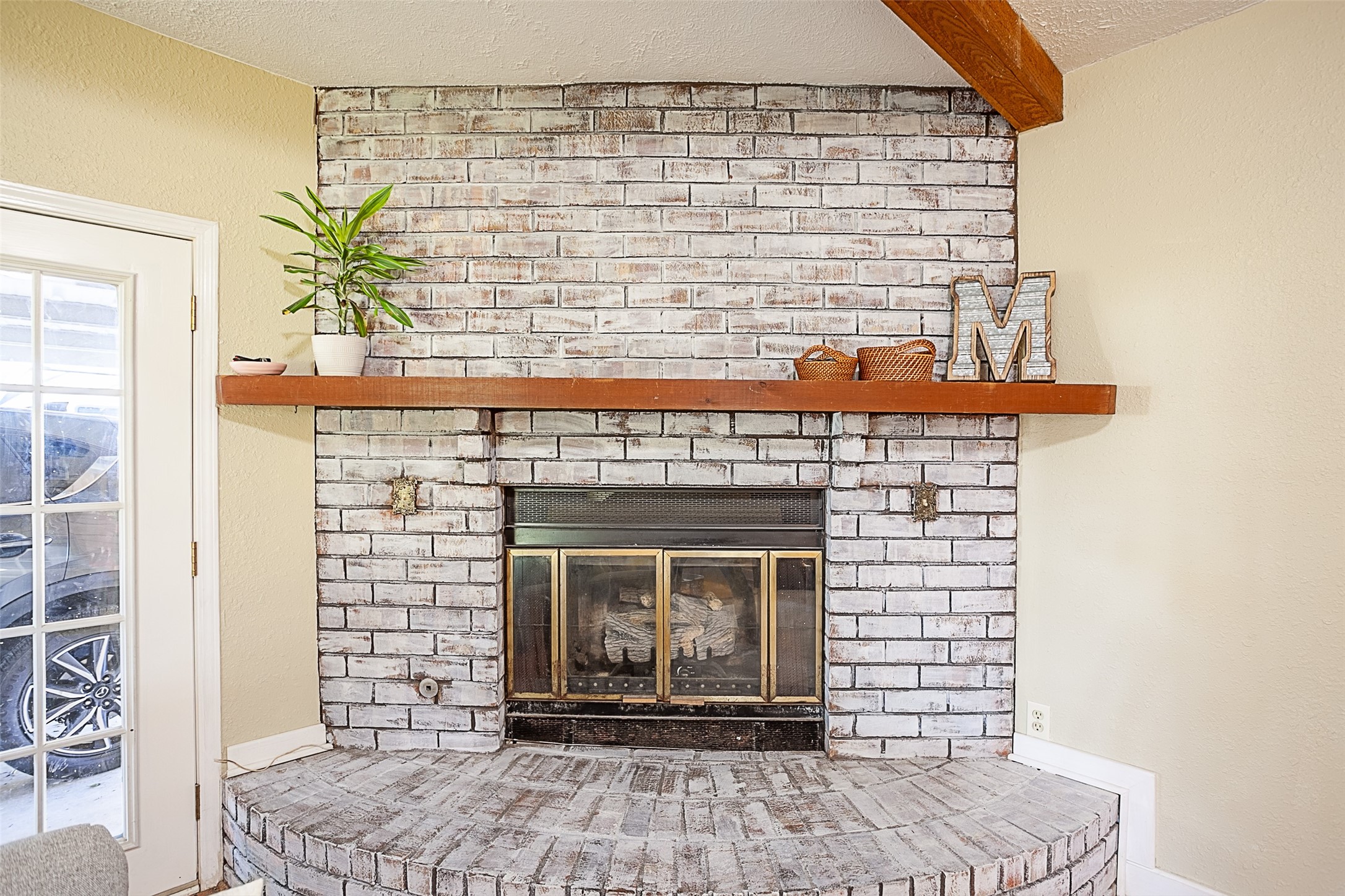 3381 Carpenter Road Orange, TX 77630 - Photo 12 of 29 a view of a fireplace with wooden floor