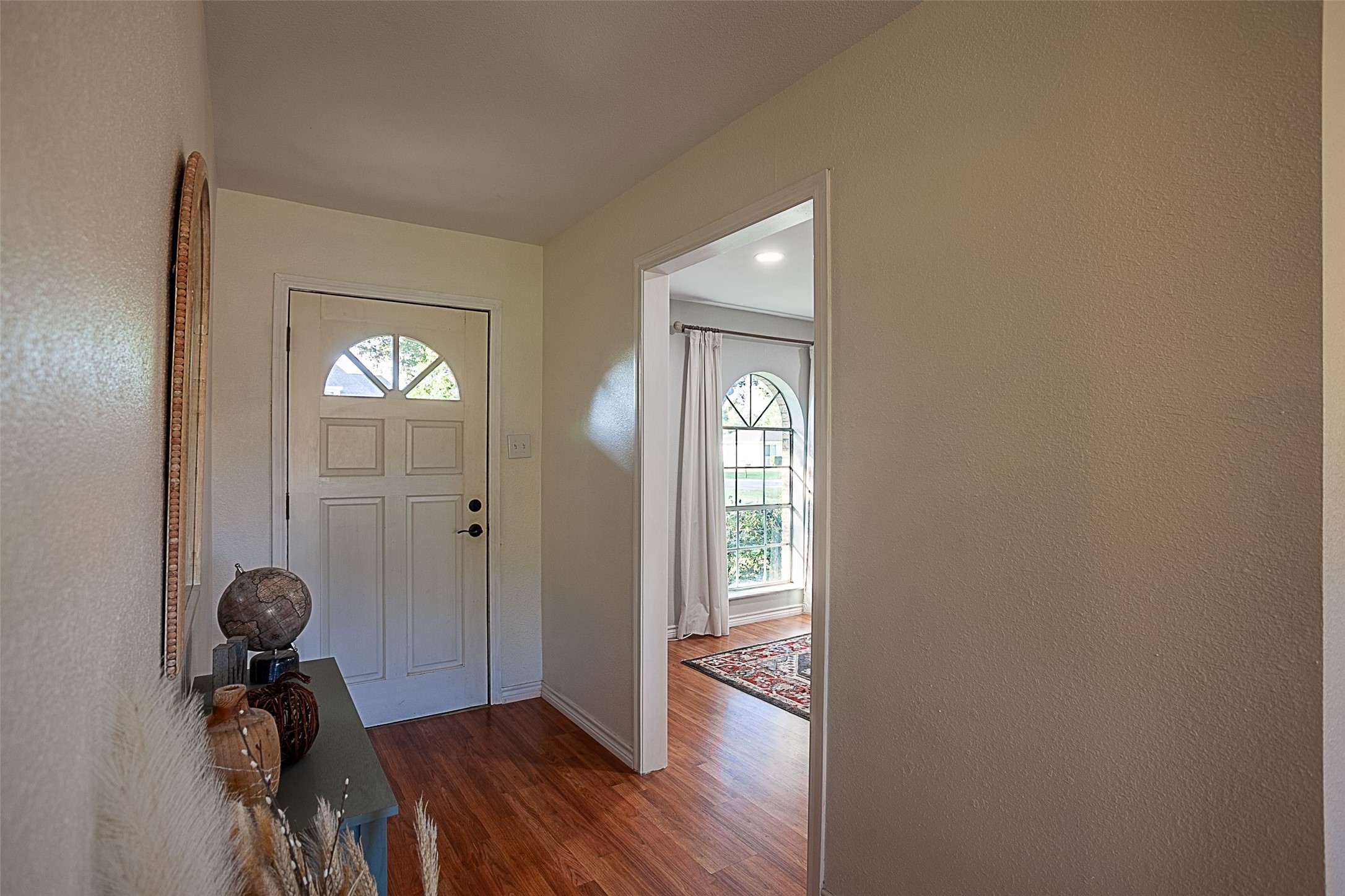 3381 Carpenter Road Orange, TX 77630 - Photo 2 of 29 a view of a livingroom with entryway and wooden floor